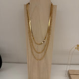 Stacked gold necklace