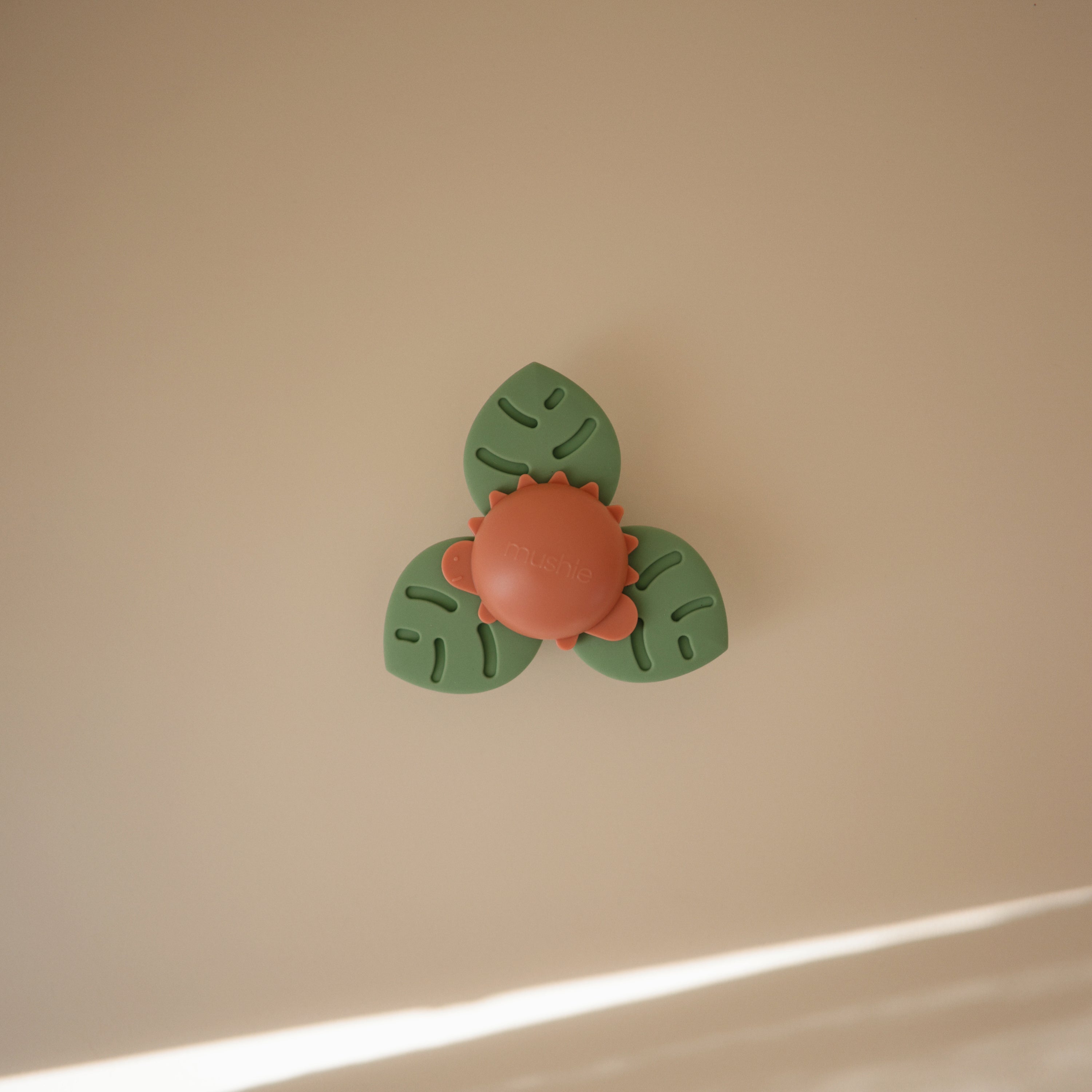 Image of Dino Suction Spinner Toy