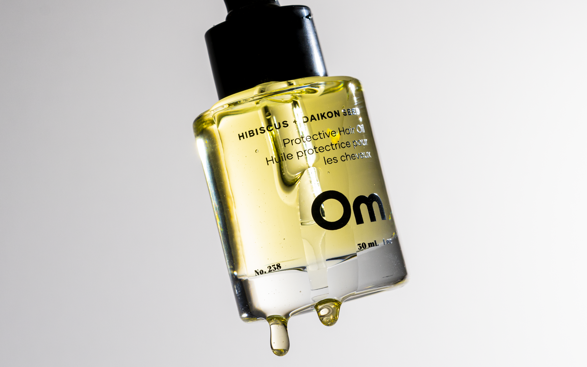 Image of Om Organics Skincare - Hibiscus + Daikon Seed Protective Hair Oil